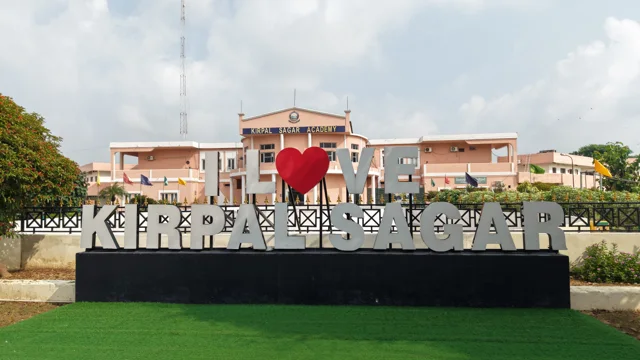 Kirpal Sagar sign in front of the Academy